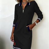 Black long-sleeve cotton zip dress with striped cuffs and hem, front zipper detail