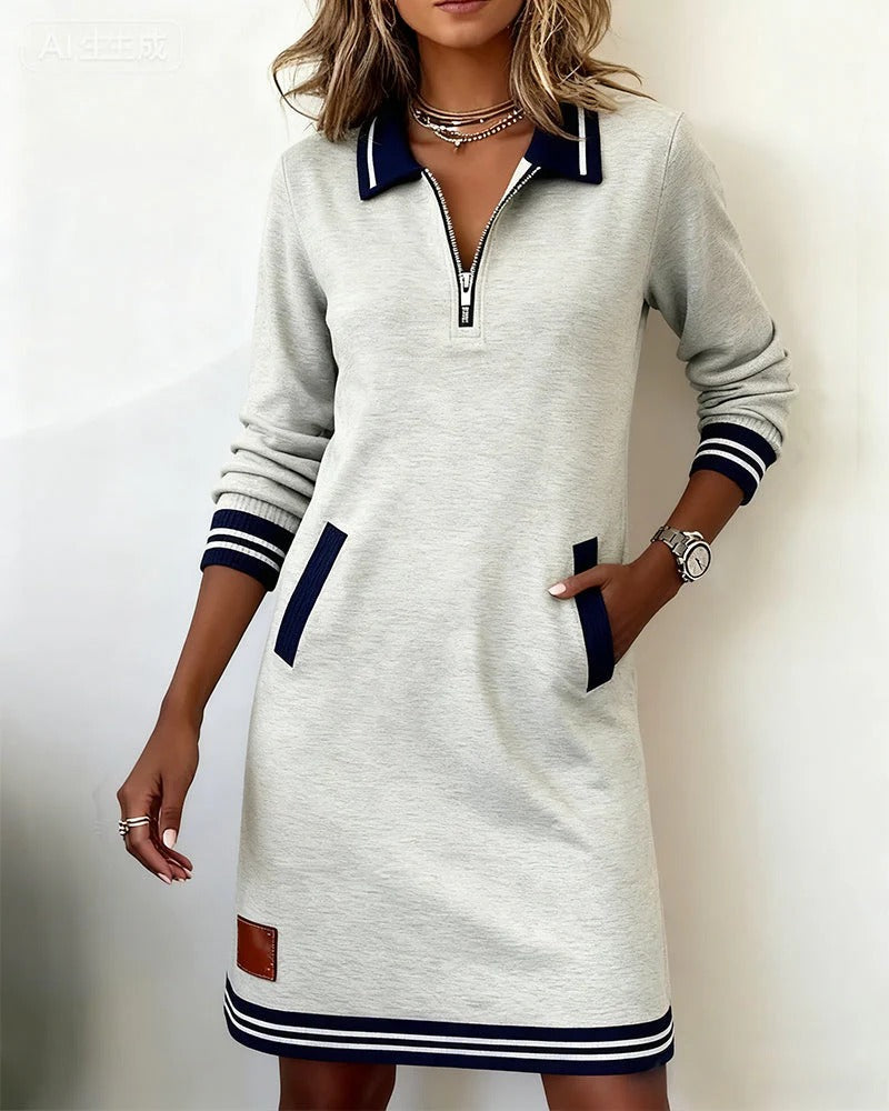 Long-sleeve cotton dress in off-white with half-zip, striped collar, cuffs, and pockets