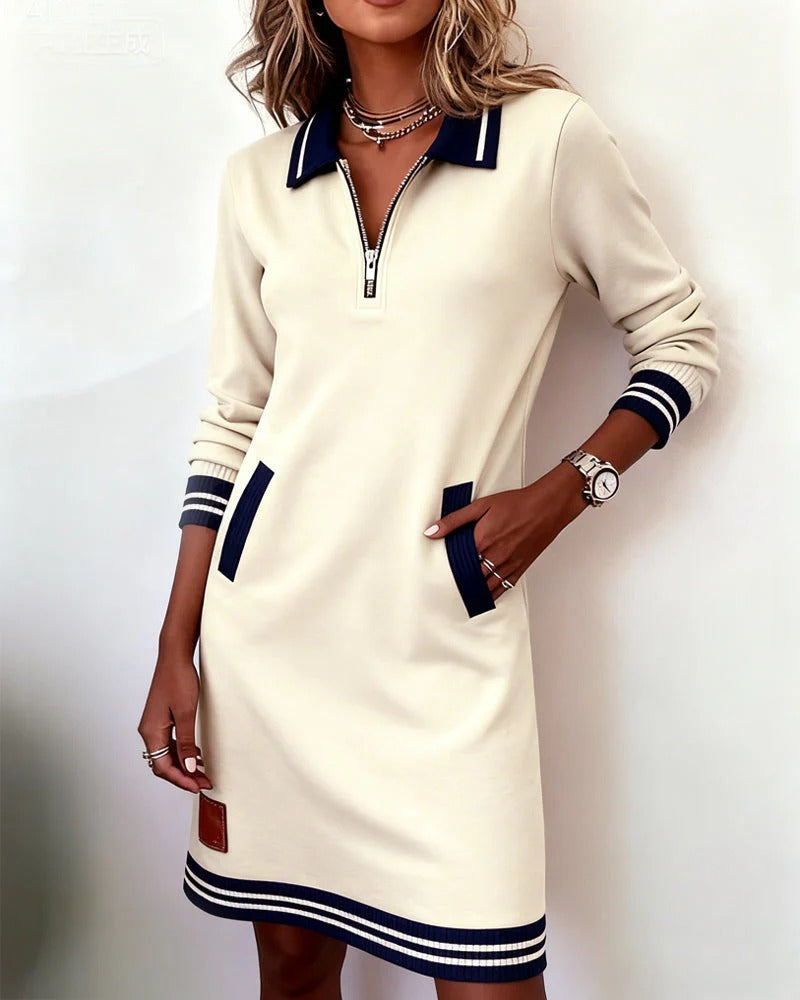Long-sleeve cotton dress in cream with half-zip, striped collar and cuffs, side pockets
