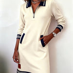 Long-sleeve cotton dress in cream with half-zip, striped collar and cuffs, side pockets