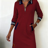 Long-sleeve cotton dress, deep red with quarter-zip and striped cuffs and hem