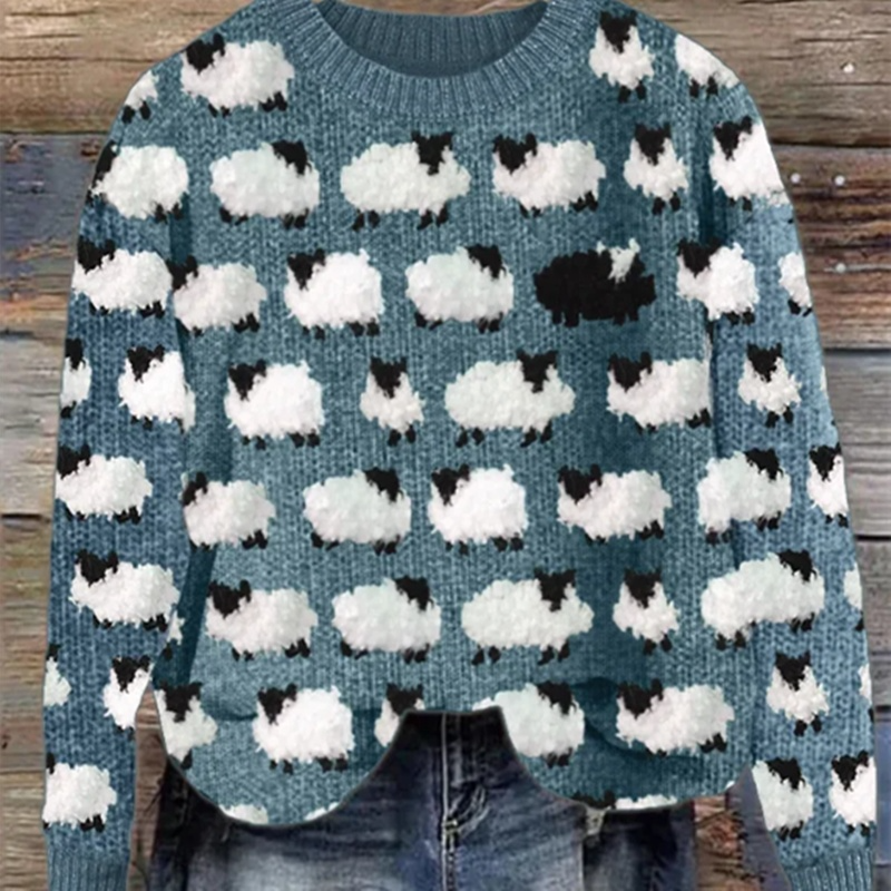 Elise blue knit hoodie with white and black sheep cloud pattern, ribbed cuffs