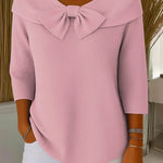 Pink women's knit sweater with oversized bow at neckline, 3/4 sleeves