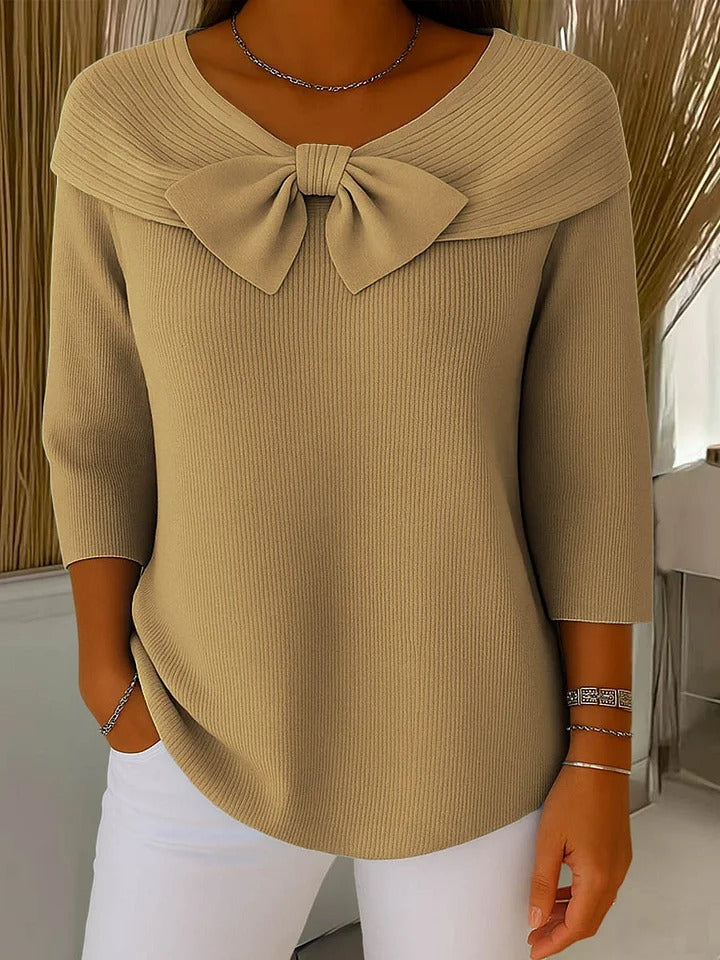 Beige women's knit sweater with oversized bow at neckline, 3/4 sleeves