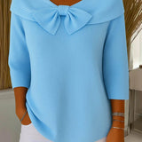 Light blue women's knit sweater with oversized bow at neckline, 3/4 sleeves