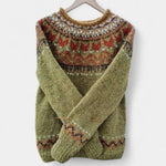 Olive green retro knit sweater with fair isle yoke pattern, crew neck and ribbed cuffs