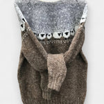 Retro knit pullover with long sleeves, crew neck, and owl-style intarsia pattern