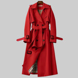 Red classic trench coat with belt, double-breasted buttons, and cuff tabs