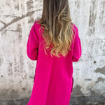 Long hooded knit cardigan, bright pink, full back view with hood