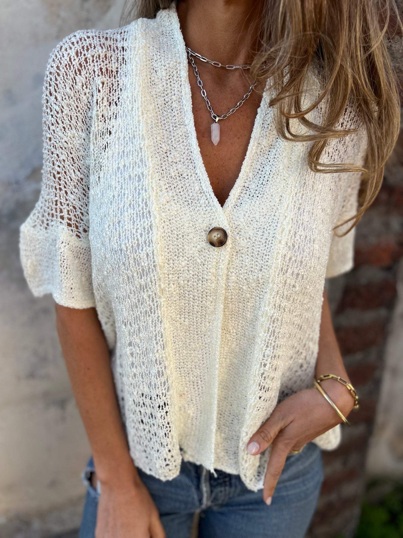 Textured knit V-neck button-front short-sleeve top in light cream