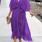 Purple V-neck midi dress with draped sleeves and tied waist sash