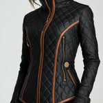 Black quilted padded jacket with stand collar, front zipper and side pockets, tan trim