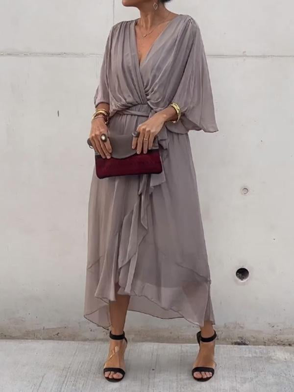 Gray V-neck midi dress with draped sleeves and tied waist belt