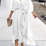 White V-neck midi dress with draped sleeves and knotted belt at the waist