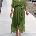 Olive green V-neck midi dress with draped sleeves and tied waist detail