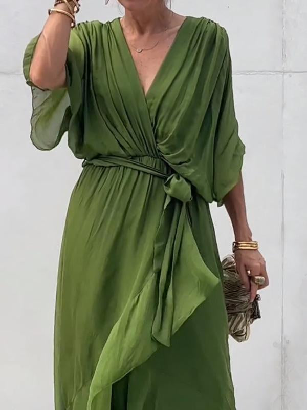 Green V-neck midi dress with draped sleeves and tied waist belt
