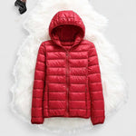 Red hooded puffer jacket with front zipper and quilted baffles