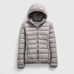 Light gray hooded puffer jacket with front zipper and quilted horizontal baffles