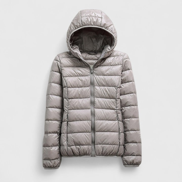 Light gray hooded puffer jacket with front zipper and quilted horizontal baffles