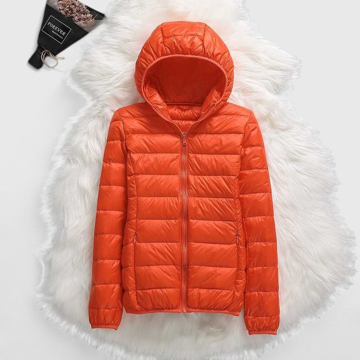 Orange hooded puffer jacket with full-length zip, quilted padding, long sleeves
