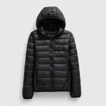Black hooded puffer jacket with front zipper and horizontal quilted baffles