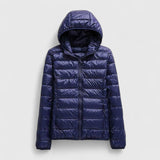 Navy purple hooded puffer jacket with front zipper and horizontal quilted baffles
