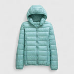 Light teal hooded puffer jacket with full-length zip, quilted insulation, long sleeves