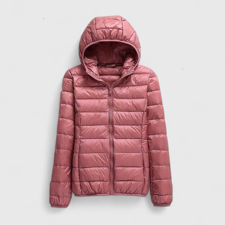 Pink hooded puffer jacket with full-length zipper, quilted padding, long sleeves