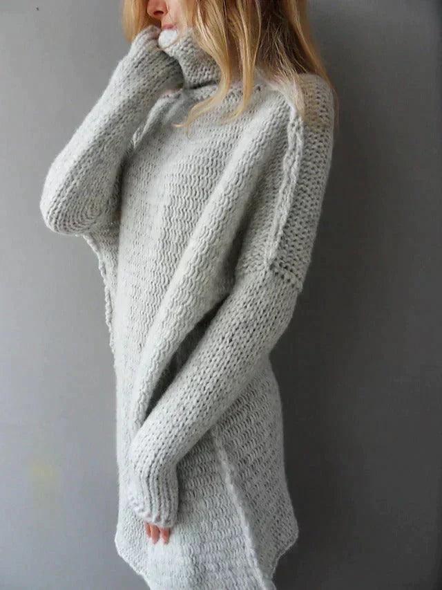 Women’s plus-size gray cable-knit pullover sweater with high neck and dropped-shoulder sleeves