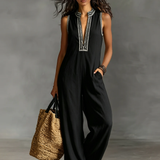 Minimalistischer, ärmelloser Damen-Jumpsuit mit Reißverschluss und Stehkragen, verziert mit Stickereien