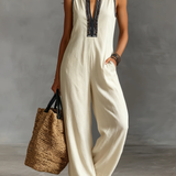 Minimalistischer, ärmelloser Damen-Jumpsuit mit Reißverschluss und Stehkragen, verziert mit Stickereien