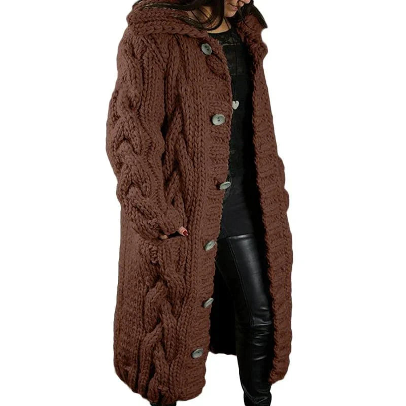 Women's long cable-knit cardigan in brown with button front and chunky textured knit.