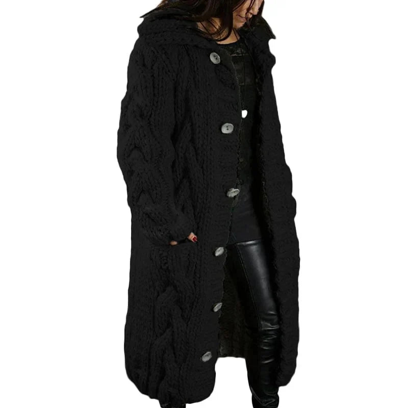 Women's long cable-knit cardigan in black with button front and textured cable pattern.