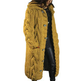 Women's long cable-knit cardigan in mustard yellow with button front and textured cable knit.