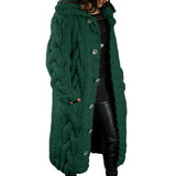 Women's long cable-knit cardigan in dark green with button front and chunky textured knit.