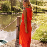 Red sleeveless midi dress, flowing skirt with side slit, sleeveless bodice