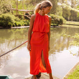 Red sleeveless midi dress, high neck, gathered back, side slit