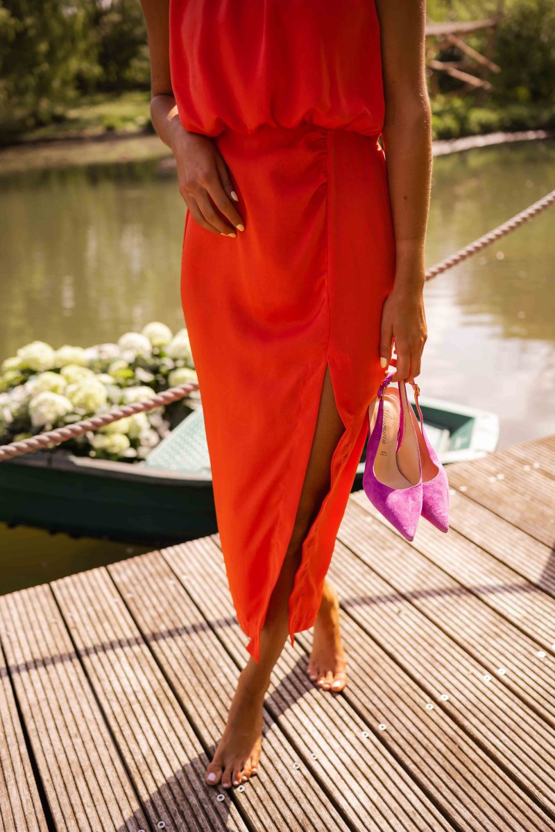 Red sleeveless midi dress with side slit and waist tie
