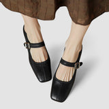 Black orthopedic Mary Jane heeled shoes with ankle strap and buckle