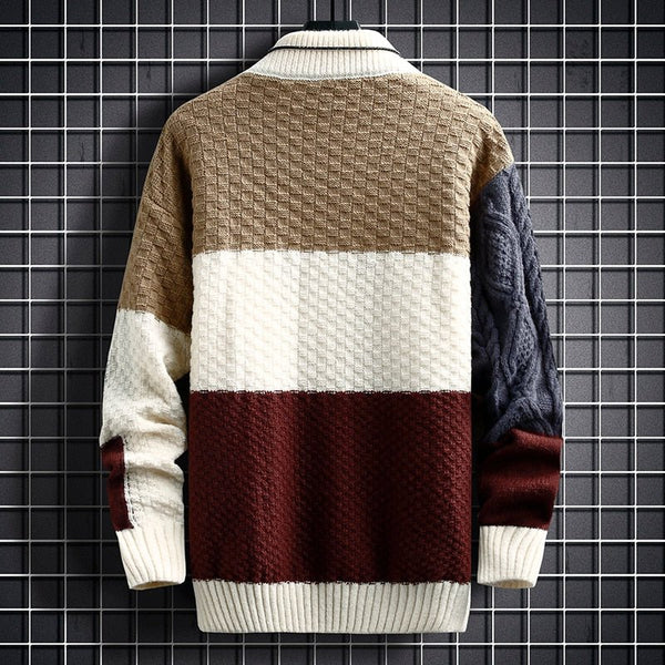 Patchwork knit pullover back view with cream center panel and dark red lower block