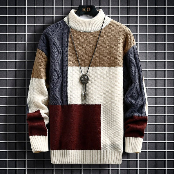 Patchwork knit pullover with cream, navy, and burgundy color blocks and ribbed cuffs