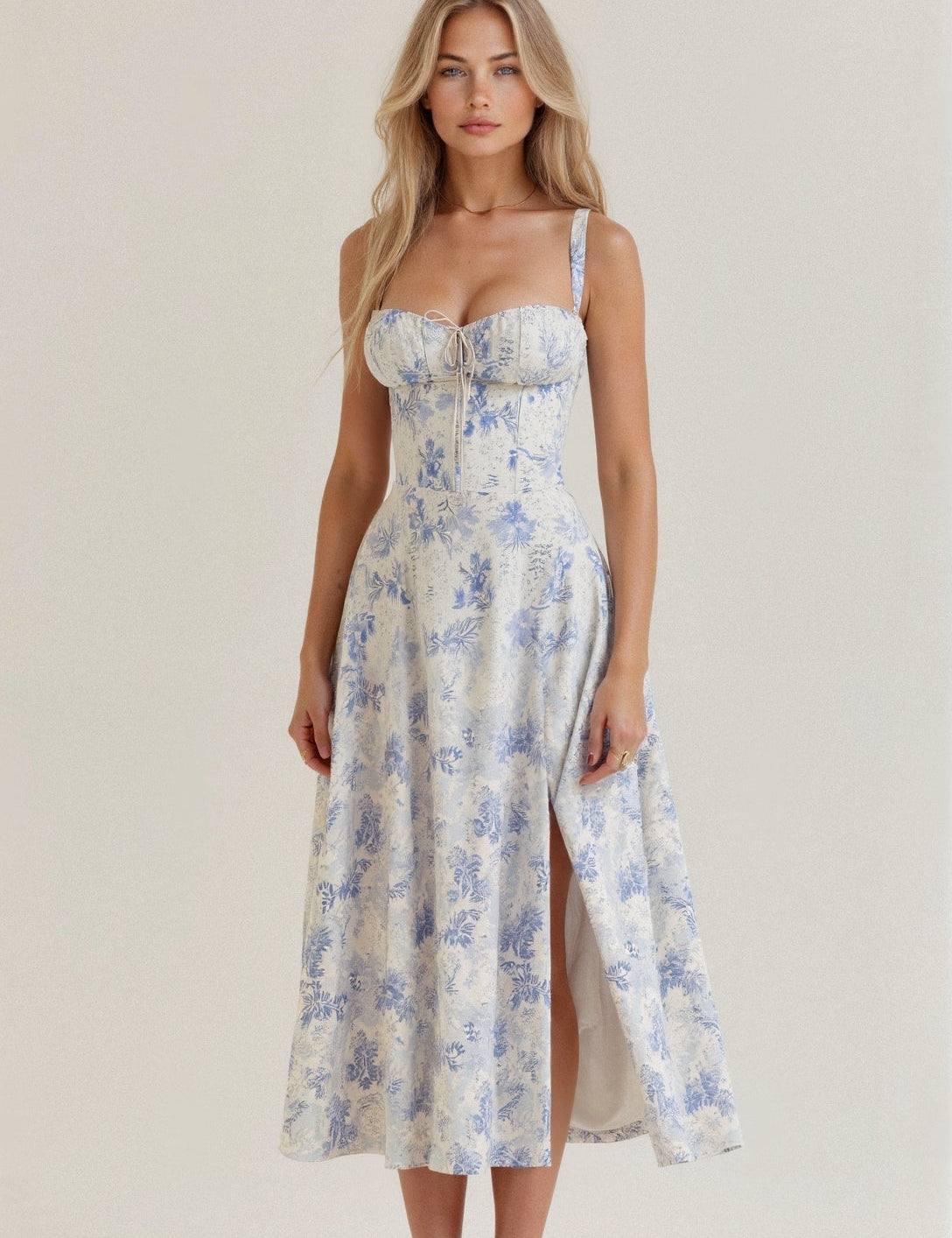 Light blue floral waist dress with square neckline and spaghetti straps
