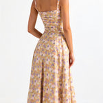 Light floral waist dress with open back and thin shoulder straps