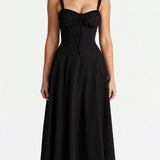Black midi dress with spaghetti straps, ruched bust, gathered waist, sleeveless
