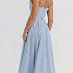 Women’s sleeveless midi dress, light blue gathered waist and fitted bodice