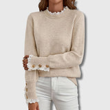 Beige crewneck lace sweater with buttoned lace cuffs and long sleeves