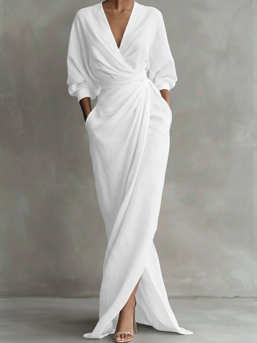 White wrap maxi dress with V-neck, gathered waist and long puff sleeves