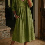 Antonia A-line maxi dress in olive green, V-neck, 3/4 sleeves, gathered waist.