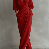 Red wrap maxi dress with V-neck, gathered waist and long puff sleeves