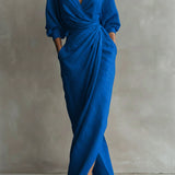 Blue wrap maxi dress with V-neck, gathered waist and long puff sleeves